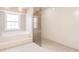 Bathroom showcasing a soaking tub next to a frameless glass shower at 27425 Jones Loop Rd, Punta Gorda, FL 33982