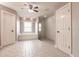 Bathroom featuring a soaking tub and frameless glass shower at 27425 Jones Loop Rd, Punta Gorda, FL 33982