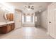 Expansive bathroom with large soaking tub and separate glass-enclosed shower at 27425 Jones Loop Rd, Punta Gorda, FL 33982