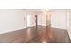 Bright bedroom with multiple entryways and attractive wood-look floors at 27425 Jones Loop Rd, Punta Gorda, FL 33982