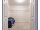 Walk-in closet providing ample storage; wire shelving maximizes organization at 27425 Jones Loop Rd, Punta Gorda, FL 33982