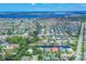 Beautiful aerial view of waterfront homes with private docks lining a canal with access to the open bay at 4708 Clipper Dr, Bradenton, FL 34208