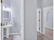 Bathroom featuring pedestal sink with modern fixtures at 4708 Clipper Dr, Bradenton, FL 34208