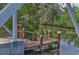 Picturesque private boat dock with boat lift. Enjoy direct access to the water from your backyard at 4708 Clipper Dr, Bradenton, FL 34208