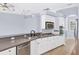 Beautiful kitchen featuring stainless steel appliances, granite counters, white cabinets, and tile flooring at 4708 Clipper Dr, Bradenton, FL 34208