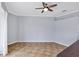 The spacious living area features neutral paint, tile floors, and a contemporary ceiling fan at 4708 Clipper Dr, Bradenton, FL 34208