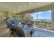Spacious screened patio with comfortable seating and stunning views of the lake at 603 Harbor Shore Dr, Nokomis, FL 34275