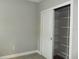 A storage closet with shelving at 7486 Divot Loop # 7486, Bradenton, FL 34202