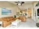 Spacious living area with comfortable seating, open floor plan, neutral colors, bright and airy at 5281 Mahogany Run Ave # 822, Sarasota, FL 34241