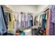Walk-in closet with wire shelving racks for ample storage of clothes and personal items at 7668 Registrar Way, Sarasota, FL 34243