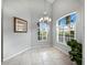 Bright dining room featuring shuttered windows, neutral walls, and tile flooring at 8737 Pebble Creek Ln, Sarasota, FL 34238