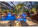 Gorgeous enclosed pool area with dual waterfalls and lush landscaping at 11432 Savannah Lakes Dr, Parrish, FL 34219