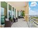 Relaxing balcony features comfortable seating and views of the intercostal waterway at 130 Riviera Dunes Way # 1104, Palmetto, FL 34221
