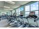 Well-equipped fitness center with modern treadmills and beautiful views at 130 Riviera Dunes Way # 1104, Palmetto, FL 34221