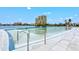 Beach front property featuring an expansive lagoon pool surrounded by concrete at 130 Riviera Dunes Way # 1104, Palmetto, FL 34221