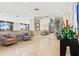 Inviting lobby space with comfortable seating, stylish decor, and tasteful decorations at 130 Riviera Dunes Way # 1104, Palmetto, FL 34221