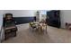 Spacious playroom featuring neutral carpet, game table, and storage at 15404 Trinity Fall Way, Bradenton, FL 34212