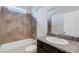 Full bathroom with a granite-topped vanity at 452 Tierra Verde Way, Bradenton, FL 34212