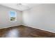 Bedroom featuring hardwood floors and a bright window at 452 Tierra Verde Way, Bradenton, FL 34212