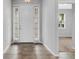 Welcoming foyer featuring tile floors and sidelights at 452 Tierra Verde Way, Bradenton, FL 34212