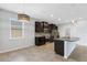 Contemporary kitchen with granite countertops, stainless appliances and island seating at 452 Tierra Verde Way, Bradenton, FL 34212