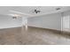 Expansive living room area featuring neutral tones, lots of natural light and modern ceiling fan at 452 Tierra Verde Way, Bradenton, FL 34212