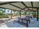 Community pavilion with picnic tables provides a shaded area for gatherings and events at 452 Tierra Verde Way, Bradenton, FL 34212