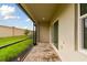 Screened patio with brick flooring and view of the backyard at 5447 Tripoli Dr, Palmetto, FL 34221