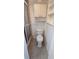 This bathroom has a toilet, built in shelves, and shower with glass door at 618 Jungle Queen Way, Longboat Key, FL 34228