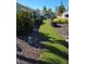 Lush landscaping and a charming alligator statue adorn the exterior of this inviting residence at 618 Jungle Queen Way, Longboat Key, FL 34228