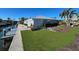 Charming waterfront home with lush lawn and private dock, perfect for relaxing by the water at 618 Jungle Queen Way, Longboat Key, FL 34228