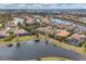 This stunning aerial view highlights the community's lakefront properties and serene setting at 16621 Berwick Ter, Lakewood Ranch, FL 34202