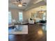 Combined office and sitting room featuring hardwood floors, modern decor, and ample light at 16621 Berwick Ter, Lakewood Ranch, FL 34202