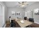 Bright office featuring modern furniture, a ceiling fan, hardwood floors, and lots of natural light at 16621 Berwick Ter, Lakewood Ranch, FL 34202