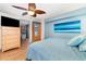 Tranquil bedroom with a cozy bed, modern decor, and a ceiling fan at 2885 Arrowhead Rd, Venice, FL 34293