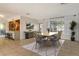 Bright dining room featuring a neutral color palette and large picture window at 418 Sarabay Rd, Osprey, FL 34229