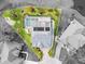 Aerial view of the home highlighting the large lot, pool, and solar panels at 6170 Misty Oaks Dr, Sarasota, FL 34243
