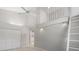 Spacious bedroom with a vaulted ceiling, ceiling fan, and loft overlooking at 6170 Misty Oaks Dr, Sarasota, FL 34243