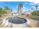 Backyard featuring a unique pool and lush, tropical landscape, creating a serene and private oasis at 624 Norsota Way, Sarasota, FL 34242