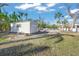 Spacious shed on lush green property, providing ample storage and functionality at 624 Norsota Way, Sarasota, FL 34242