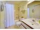 Condo bathroom featuring a shower/tub combo and vanity at 6800 Placida Rd # 2017, Englewood, FL 34224