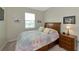 Cozy bedroom with natural light, carpeted floors, and traditional decor at 7315 Bianco Duck Ct, Sarasota, FL 34240