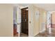 An interior view showing the elevator with metal accordion doors and white trim at 16 Tidy Island Blvd # 16, Bradenton, FL 34210