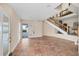 Entryway featuring tile flooring, an open staircase, and an exterior glass door with ocean views at 16 Tidy Island Blvd # 16, Bradenton, FL 34210