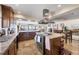 Well-appointed kitchen with granite countertops and center island open to dining and living areas at 16 Tidy Island Blvd # 16, Bradenton, FL 34210