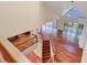 Spacious open-concept area showcasing high ceilings, hardwood floors, stairs, and water views at 16 Tidy Island Blvd # 16, Bradenton, FL 34210