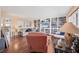 Cozy living room with hardwood floors, built-in bookshelves, and comfortable seating at 16 Tidy Island Blvd # 16, Bradenton, FL 34210