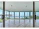 A bright and airy sunroom features tile floors, multiple windows with gorgeous views, and lots of natural light at 16 Tidy Island Blvd # 16, Bradenton, FL 34210