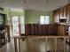 Kitchen undergoing renovation, showcasing the layout and design potential with exposed framing at 1801 Gulf N Dr # 175, Bradenton Beach, FL 34217