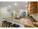 Spacious kitchen with granite countertops, seating at bar, and modern appliances, great for entertaining at 1801 Gulf N Dr # 175, Bradenton Beach, FL 34217